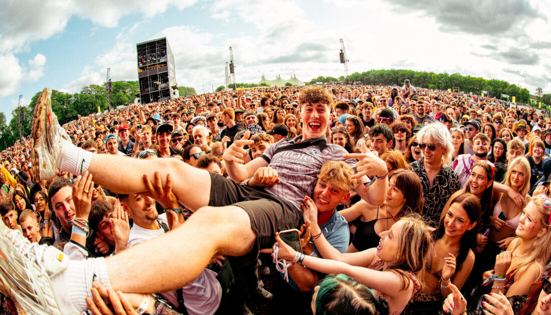 Fan crowd surfing at Reading Festival 