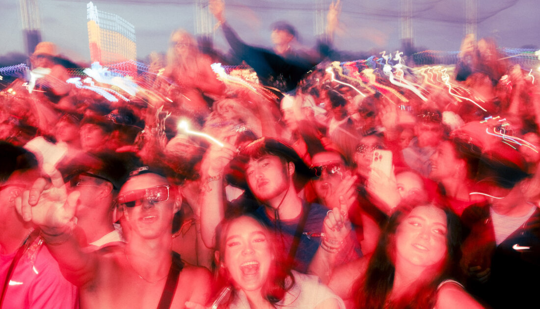 Fans smiling while at Reading Festival