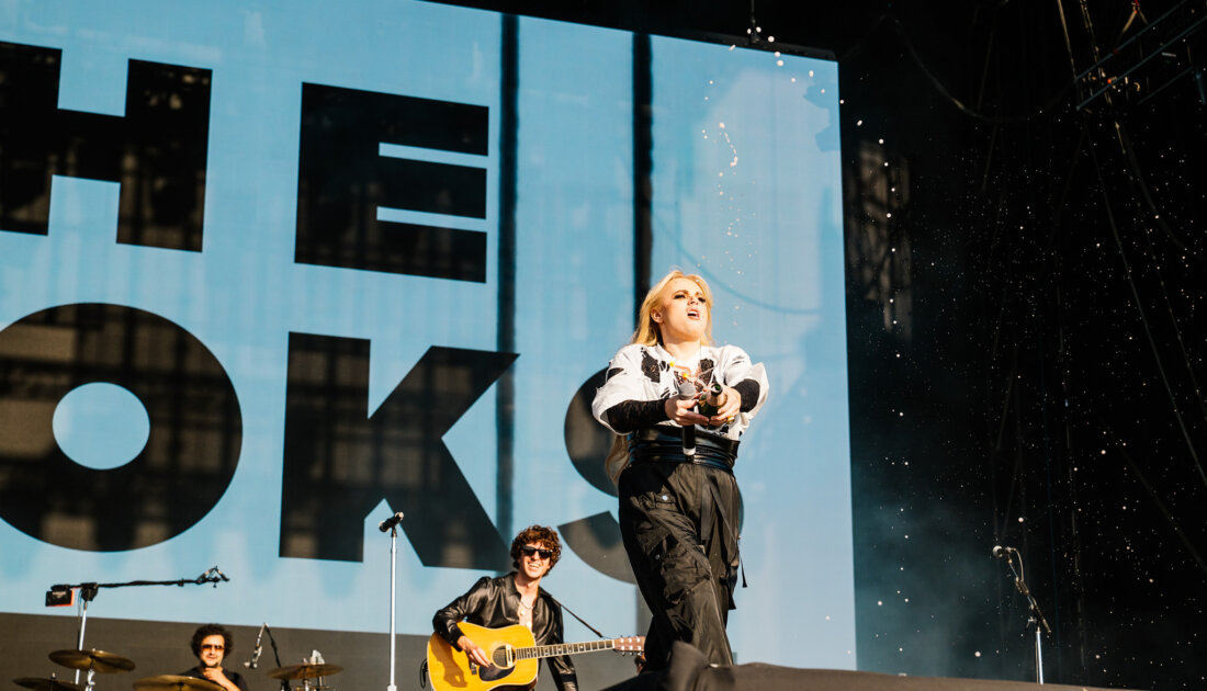 Rebel Wilson and the Kooks on stage at Reading Festival 
